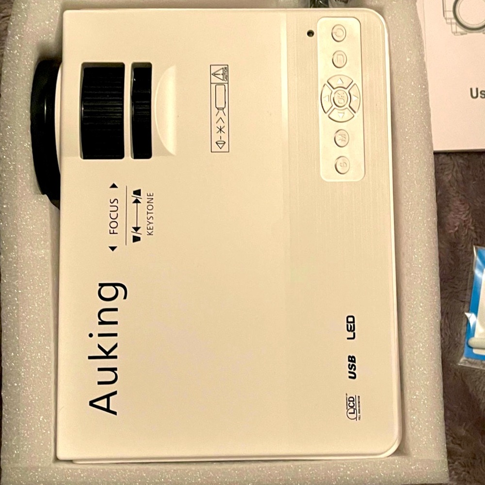 AU King mini projector, NIB.